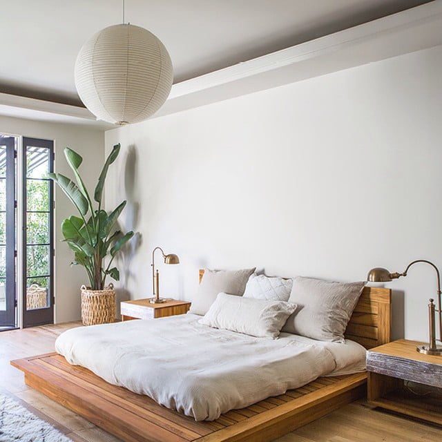 Modern Teak Bed Frame Malaysia with sleek design and rich wood grain