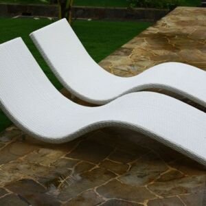 curved wicker sun lounger