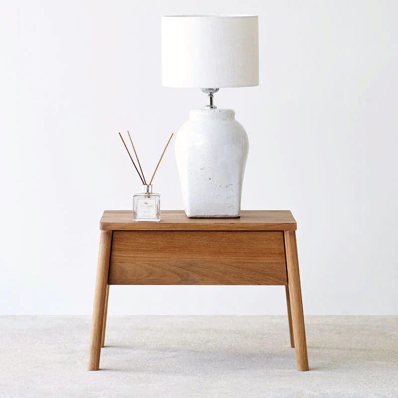 Elegant Twist Teak Wood Side Table, designed with a natural wood finish and functional shelving.